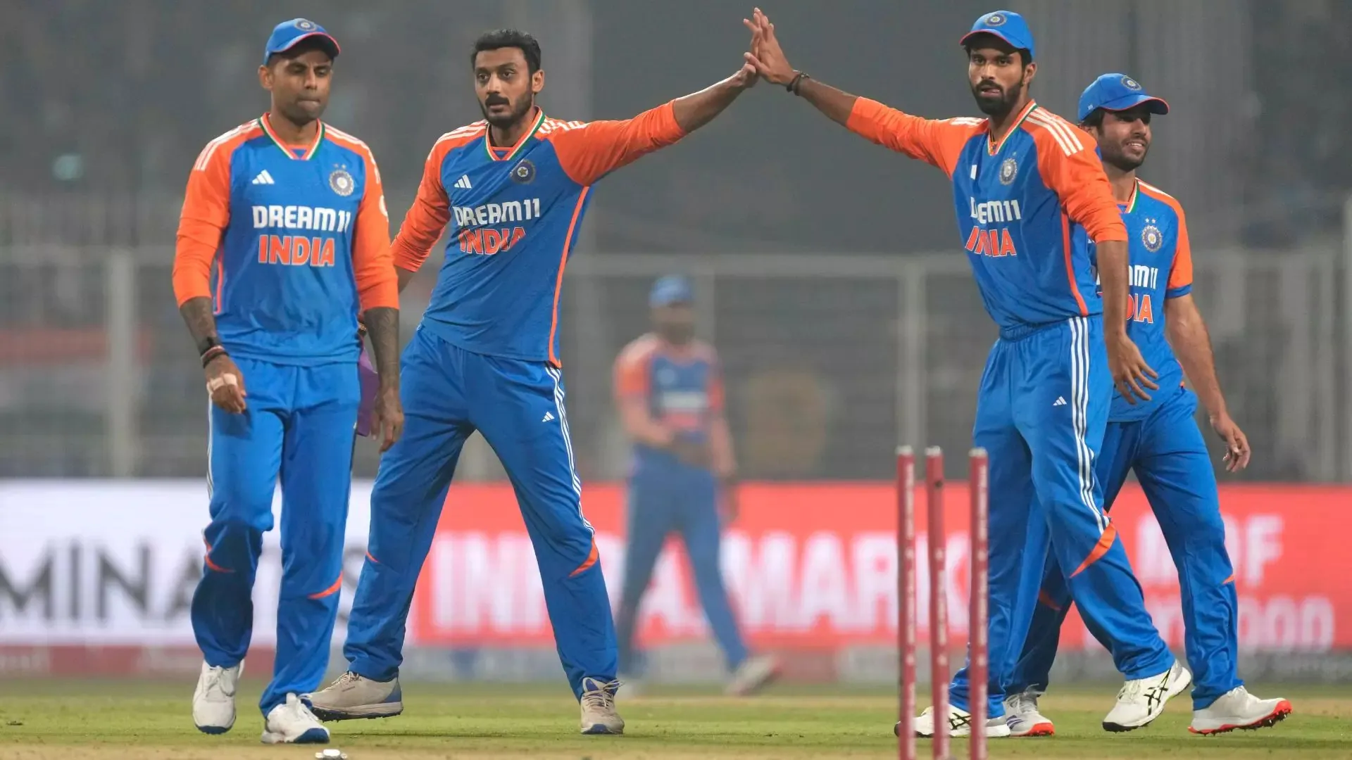 India cricketers on the field